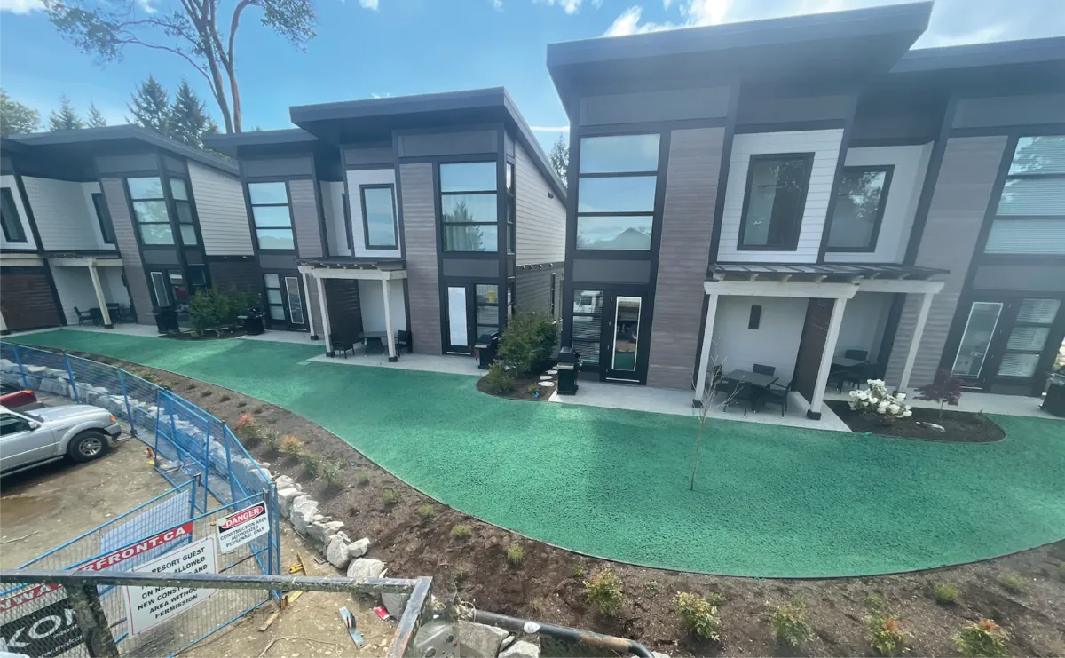 Modern townhome courtyard with completed hydroseed prep